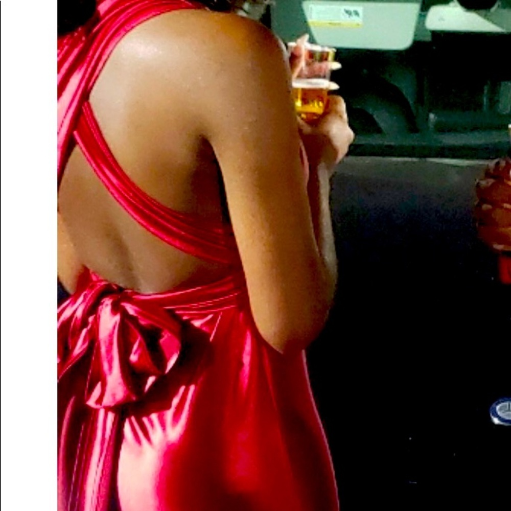 Absolutely beautiful prom dress with train , the material is outta this world.